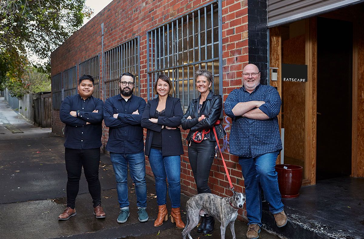 Eatscape team standing in front of studio